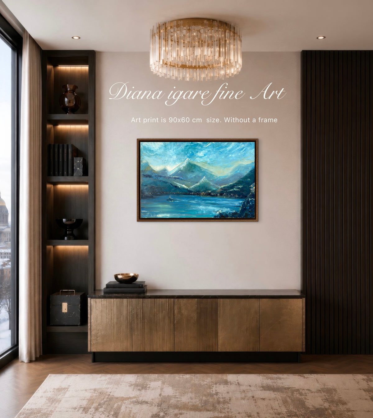 A framed landscape art print depicting blue mountains and a lake, displayed on a beige wall in a modern, stylishly decorated living room. White text on the wall reads 'Diana igare fine Art'.